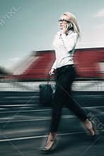Running business woman
