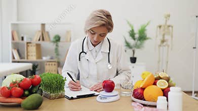 Dietitian Weighing Apple
