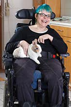 Cheerful young infantile cerebral palsy patient.