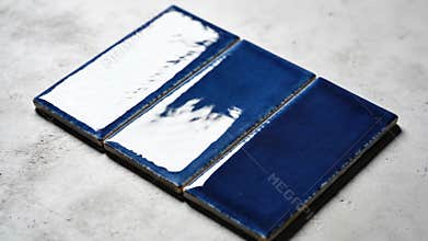 Blue and white subway tiles with crackle and textured glazes for home renovation, bathroom design,
