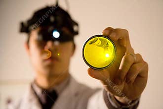 Eye Doctor examing your eyes
