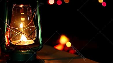 Focus pull from a lantern to a camp fire