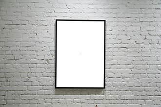 One black frame on white brick wall