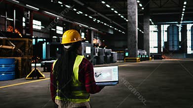 Black woman engineer, turbine asset data, injection systems, laptop screen
