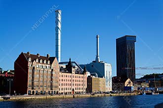Roselundverket combined heat and power powerplant on bank of Gota river next to Alvstaden development construction site
