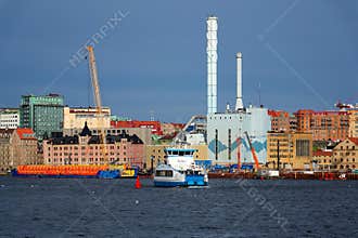 Roselundverket combined heat and power powerplant on bank of Gota river next to Alvstaden development construction site