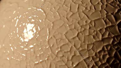 Extreme close-up slow pan across a glossy beige sphere with a detailed crackle glaze texture