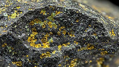 Detailed macro shot of a pyrite mineral specimen, showcasing its unique texture and color variations