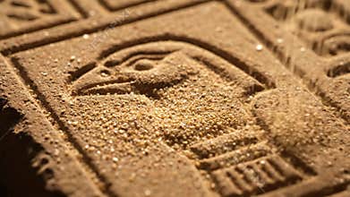 Egyptian Hieroglyph of a Falcon God Horus Carved in Stone at Ancient Temple