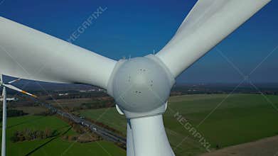 Wind turbine generating clean green energy. Great aerial view flight drone