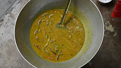 Small Snakehead or Channa orientalis fish curry.