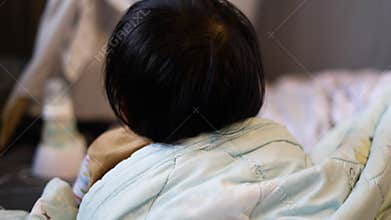 Sleepy Toddler In Bed Not Wanting To Wake Up