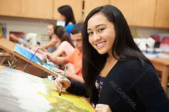 Female Pupil In High School Art Class