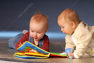 Babies with toys
