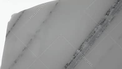 Close-up of a narrow vertical gray pillar against a bright white background with a small dark blemish