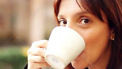 Woman drinking coffee