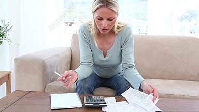 Blonde woman having financial problems