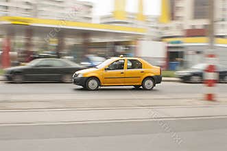 Yellow taxi blurred background