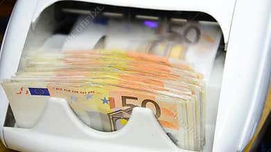 Money counts the 50 euro notes