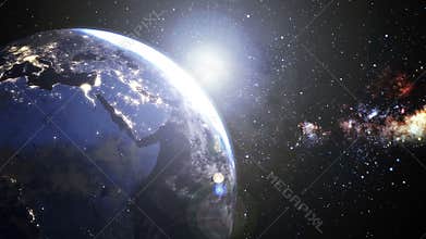 Rotating Planet earth Europe zone and Africa zone with from nighttime to day sunrise beautiful,Clouds orbits about bright Sun