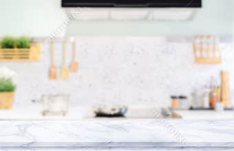 White marble texture  table top on blurred kitchen background
