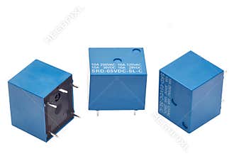 Small electromagnetic relays isolated on a white background
