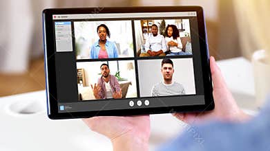Hands of woman having video chat on tablet pc