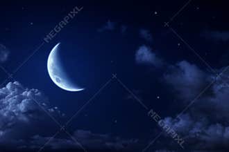 Big moon and stars in a cloudy night blue sky