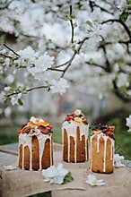 Easter cake decorated with glaze and dry fruits