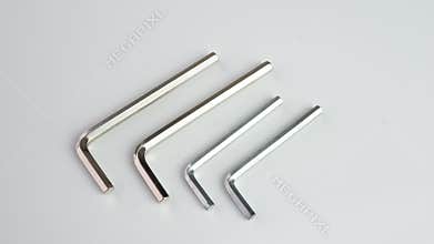 four hex wrenches on a white background