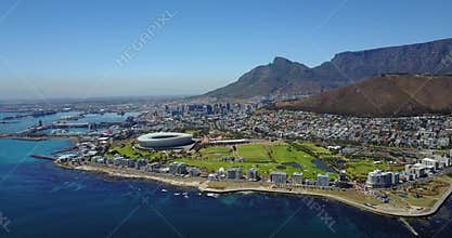 4K Footage Aerial View to the Capetown City Center with the Stadium and Green Hills, South Africa