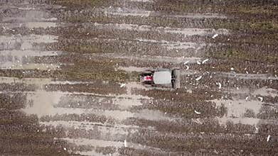 Bird eye view descending tractor cultivate