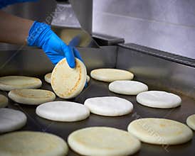 Chef cooking venezuelan arepas