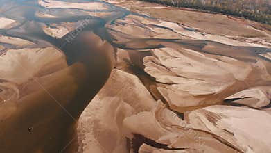 Dramatic aerial view of empty Vistula riverbed in Poland. Very dry summer. Drought natural disaster.
