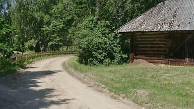 Old rustic log barn in countryside