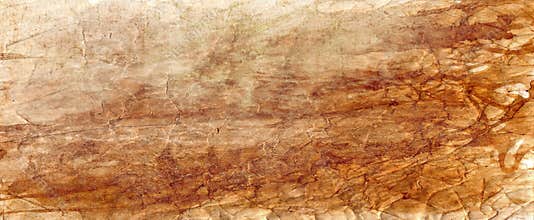 Old brown parchment paper background with yellowed vintage grunge texture borders and off white light center with distressed faded