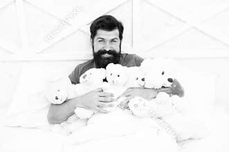 Deal with loneliness on holidays. Happy birthday. Man with beard happy face hold gift toy. Toys shop. present to