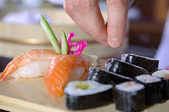 chef preparing sushi