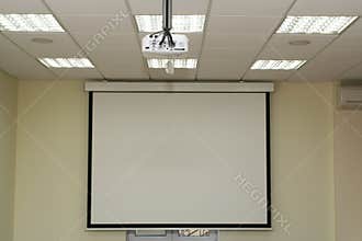 Projection screen in the boardroom with overhead projector