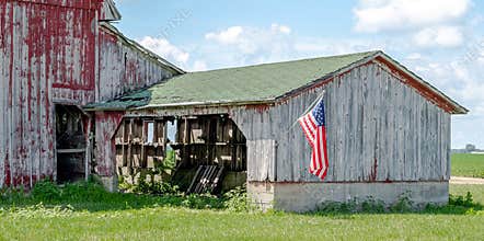 Crumbling Old Barn With American Flag