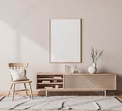Scandinavian interior design of living room with rattan console, wooden chair, mock up poster frame