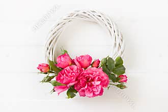 Pink Roses wreath,  flat lay, floral composition on white wooden board, empty space for  text, concept for Wedding , St. Valentine