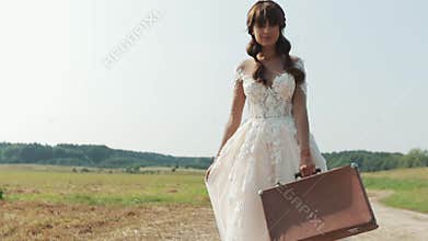Beautiful Bride Enjoying In Wedding Dress In Sunny Park.