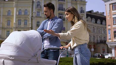 Irritated parents arguing crying baby, relations crisis, parenting difficulties