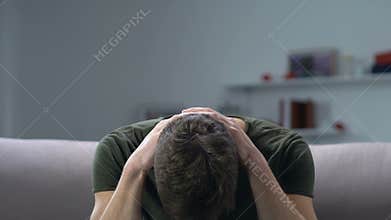 Worried military man suffering posttraumatic stress disorder, negative memories