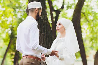 National wedding. Bride and groom. Wedding muslim couple during the marriage ceremony. Muslim marriage.
