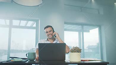 Business man talking mobile phone. Concentrated man arguing on mobile phone