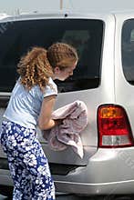 Teen Girl Drying Car