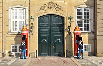 COPENHAGEN, DENMARK - FEBRUARY 27 : Royal guards at Amalienborg Slot in Copenhagen - Denmark. This palace is the home of the
