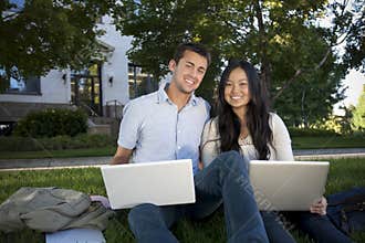 Beautiful College Students Studying together